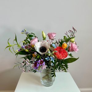 Petite Gem tier floral arrangement in a vase.
