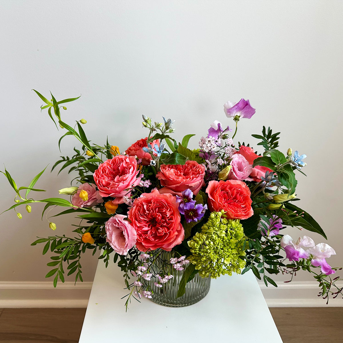 Stunning Gem tier floral arrangement in a vase.